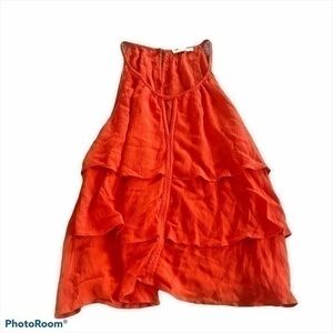 Orange Rayon BCNU ruffle tank rop
